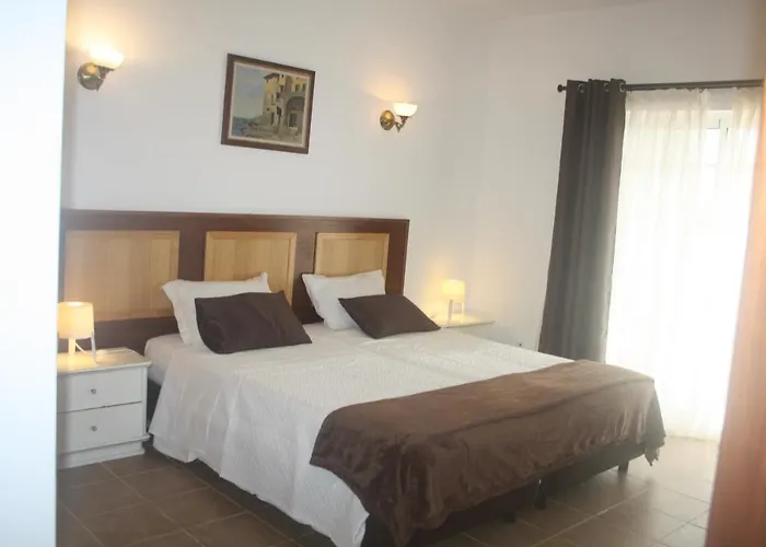 ゲストハウス Rustic ファロ